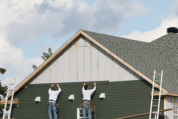 Professional Storm Damage Siding Repair technician working in Carthage, NC
